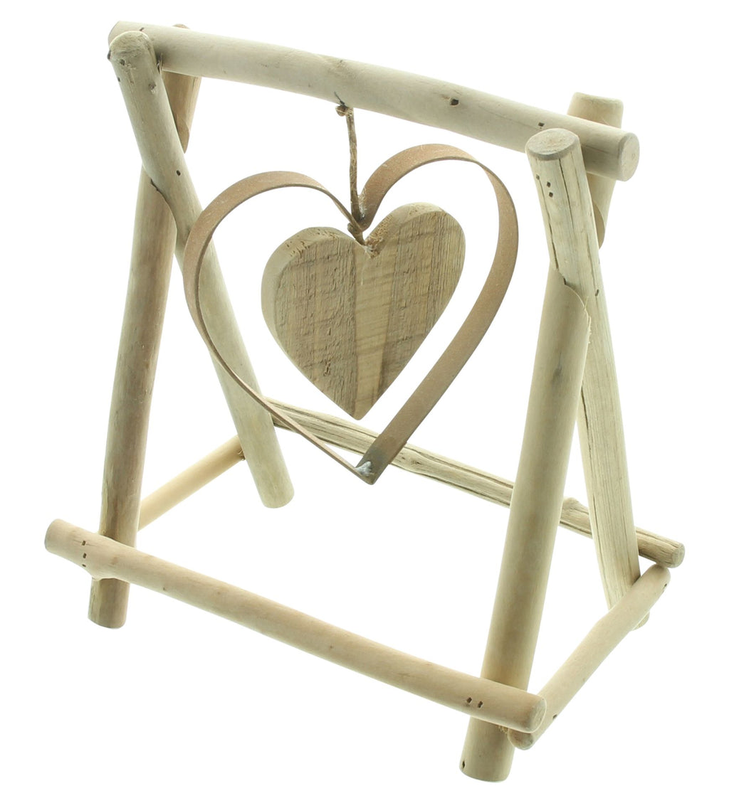 Schwingendes Herz im Holzgestell